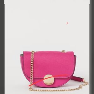 Cerise Magneta Pink bag. Small half moon shaped crossbody bag with gold hardware